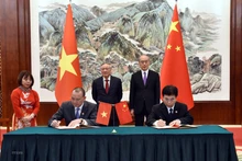 签署仪式现场。（图片来源：越通社）