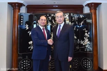 越南外交部长裴青山会见中共中央政治局委员、中央外事工作委员会办公室主任王毅。（图片来源：国际报）