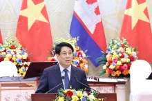越南国家主席梁强在招待会上发表讲话。（图片来源：越通社）