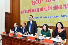 越南国家银行副行长陶明秀在1月3日举行的2024年银行工作任务部署的新闻发布会上发言。