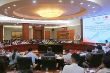 座谈会场景。（图片来源：越通社）