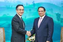 越南政府总理范明正会见日本丸红株式会社社长柿木真澄。（图片来源：VGP）