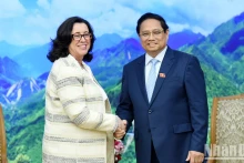 越南政府总理范明正会见世行副行长曼努埃拉·费罗。（陈海 摄）