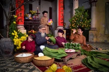春节包粽子起源于雄王时代，并成为越南民族过年时不可缺少的传统文化。