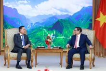 越南政府总理范明正会见柬埔寨副首相涅沙文。