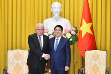国家主席梁强和巴勒斯坦总统的特使里亚德·马尔基。