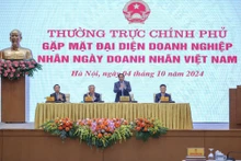 越南政府总理范明正主持政府与企业家、企业代表见面会。（图片来源：越通社）