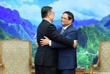 越南政府总理范明正和中国全国人大常委会副委员长张庆伟。