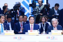 越南政府总理范明正出席金砖国家领导人扩大会议。（图片来源：VGP）