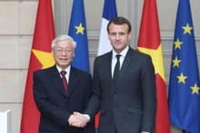 越共中央总书记阮富仲与法国总统马克龙。