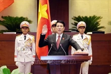 越南国家主席梁强宣誓就职。图片来源: 越通社