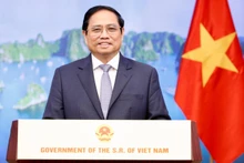 越南政府总理范明。（图片来源：VGP）