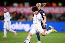 越南女足队的陈氏秋（白衣）。