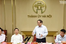 越南政府总理范明正与河内市委常务委员会举行工作会议【组图】