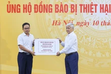 越南祖国阵线接收台风摩羯救灾捐赠【图表新闻】