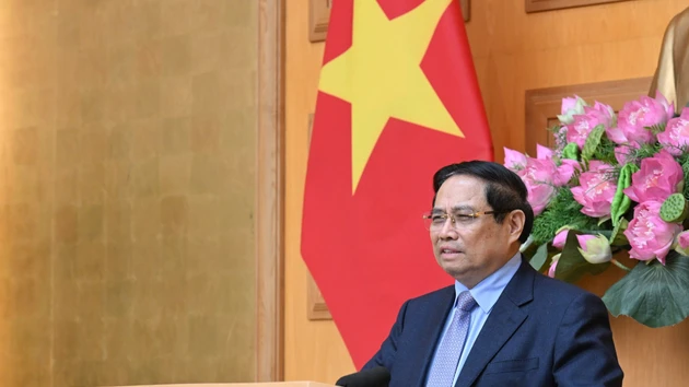 范明正总理在会上发表讲话。