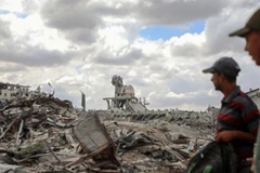 加沙地带汗尤尼斯冲突中损毁的建筑物。（图片来源：新华社/越通社）