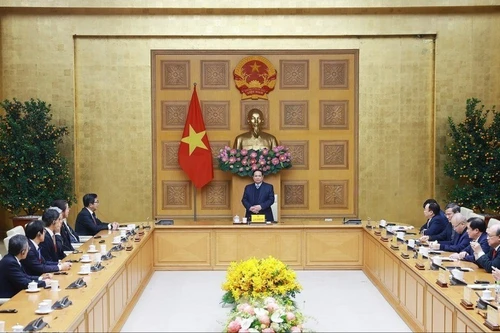 越南政府总理范明正会见日本企业家代表团现场。（图片来源：越通社）