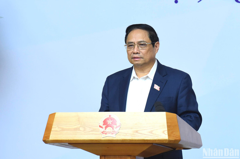 范明正总理在会上发表讲话。 范明正总理在会上发表讲话。