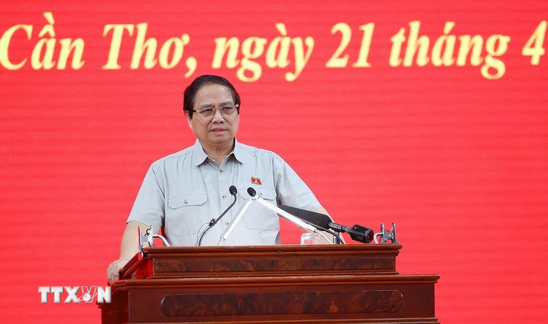 范明正总理在会上发表讲话。