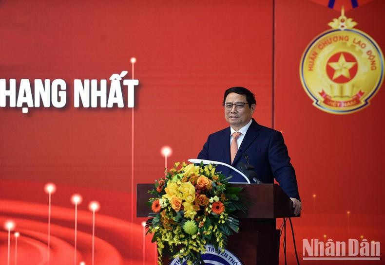 政府总理范明正出席会议并发表讲话。（陈海 摄）