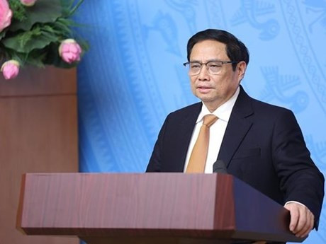 范明正总理在会上发言。