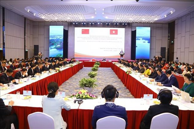 越南祖国阵线中央与中国全国政协暨边境省份组织友好交流活动场景。（图片来源：越通社）