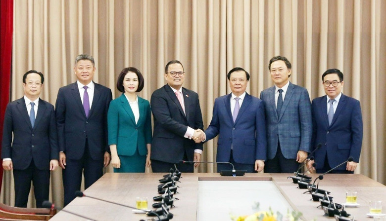 双方代表合影。