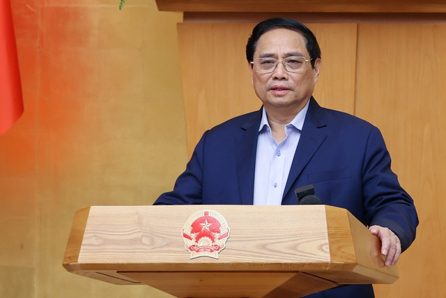 政府总理范明正在会上发表讲话。（图片来源：VGP）