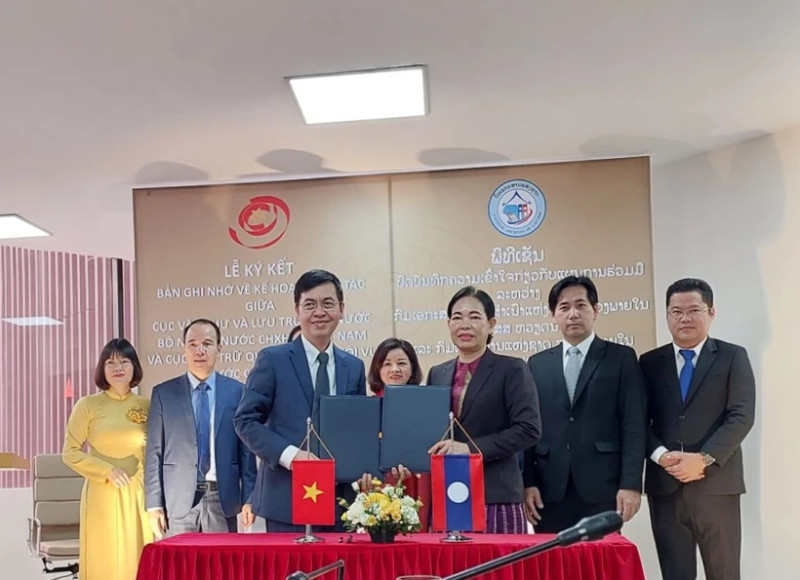 越南与老挝签署文书档案领域的合作谅解备忘录。（图片来源：越通社）
