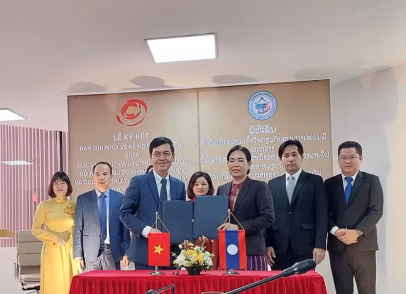 越南与老挝签署文书档案领域的合作谅解备忘录。（图片来源：越通社）