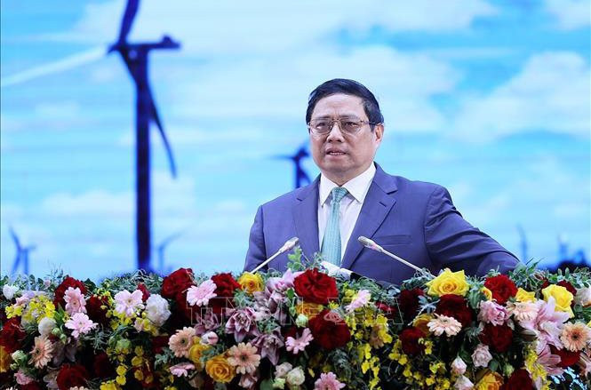 范明正总理在会上发表讲话。