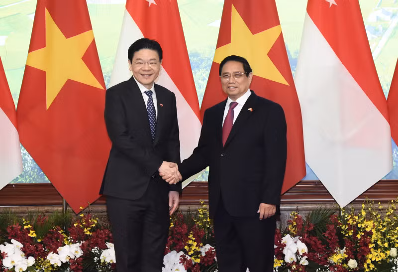 越南政府总理范明正和新加坡总理黄循财。