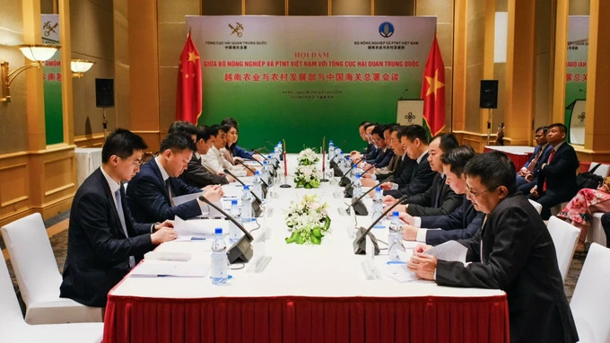 会谈场景。（图片来源：sggp.org.vn）