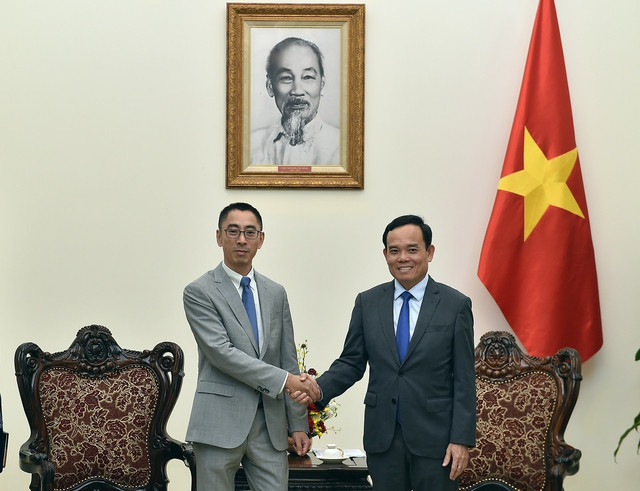 越南政府副总理陈流光会见华为亚太公共及政府事务副总裁张正军。（图片来源：baochinhphu.vn）