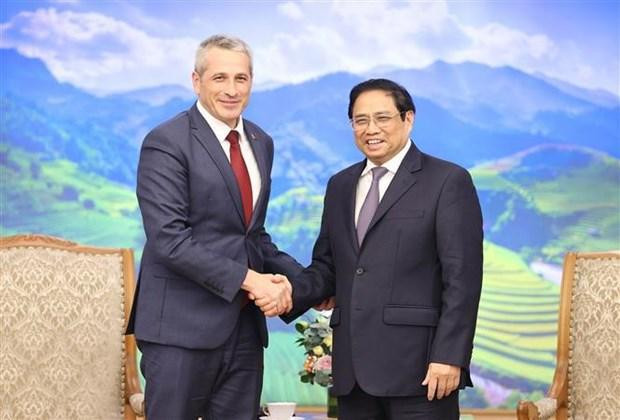 范明正总理和乌拉吉米尔·巴拉维库大使。（图片来源：越通社）