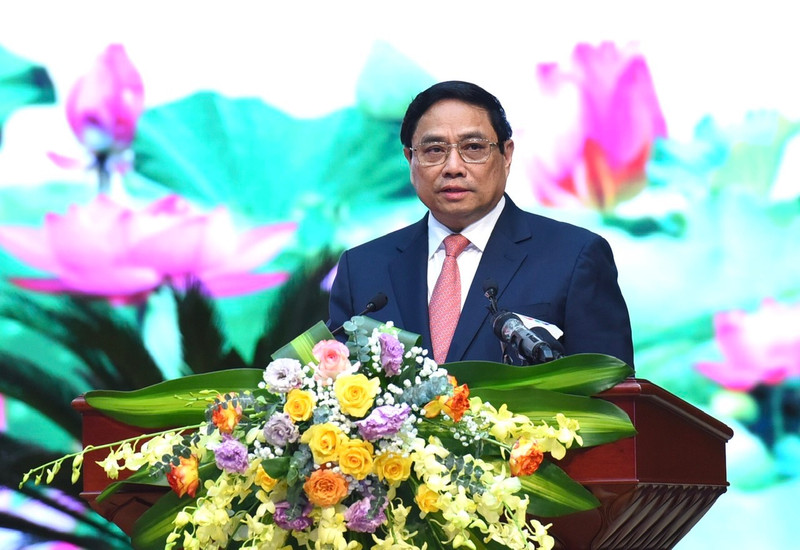 范明正总理在会上发表讲话。