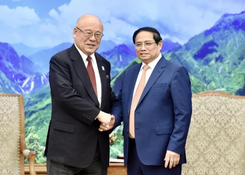 政府总理范明正会见日越友好议员联盟特别顾问武部勤。（图片来源：越通社）