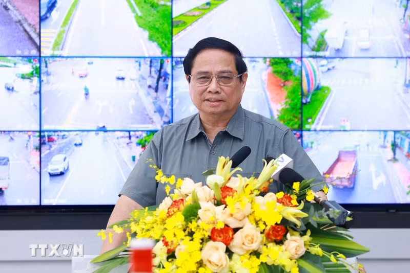 政府总理范明正在会上发表讲话。（图片来源：越通社）