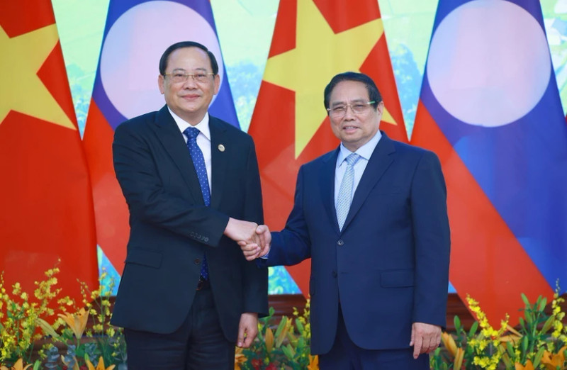 越南政府总理范明正与老挝政府总理宋赛·西潘敦。