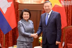 越共中央总书记、国家主席苏林和柬埔寨王国国会主席昆索达莉亲王。