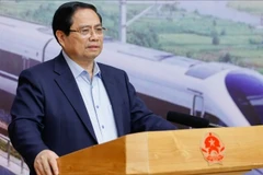 范明正总理在会上发表讲话。（图片来源：VGP）