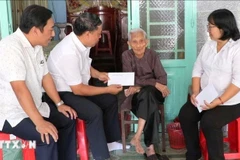 喜迎越共十四大和2026丙午年春节：全国超588万人已收到党和国家慰问金。（图片来源：越通社）