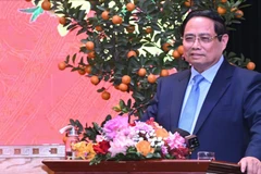 范明正总理在见面会上发表讲话。（陈海 摄）