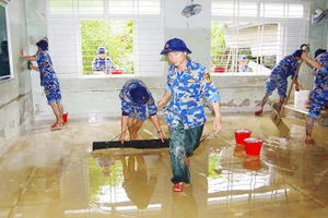 洪涝灾害后重建工作。（海论 摄）