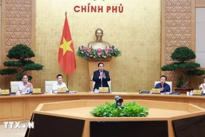 越南政府总理范明正主持会议。（图片来源：越通社）