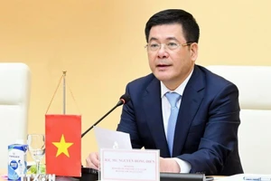 越南工贸部长、2025年秋季博览会指导委员会常务副主任阮鸿延。（图片来源：越通社）