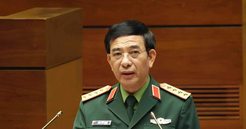 越共中央政治局委员、中央军委副书记、国防部长潘文江大将作报告。（图片来源：越通社）