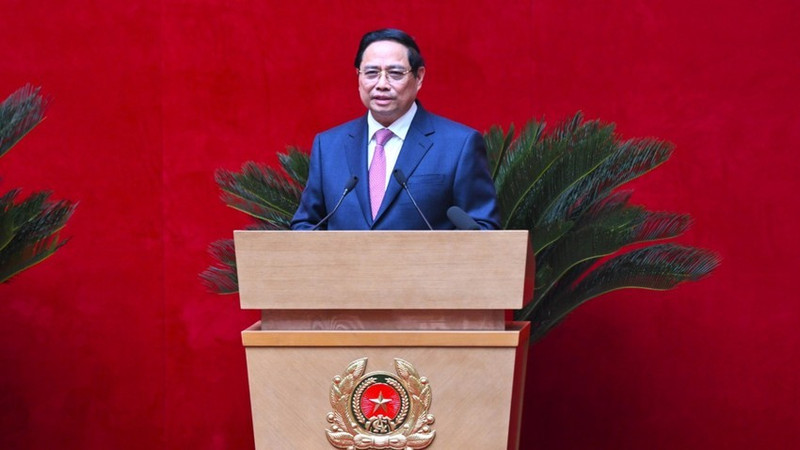 越南政府总理范明正在活动上发表讲话。