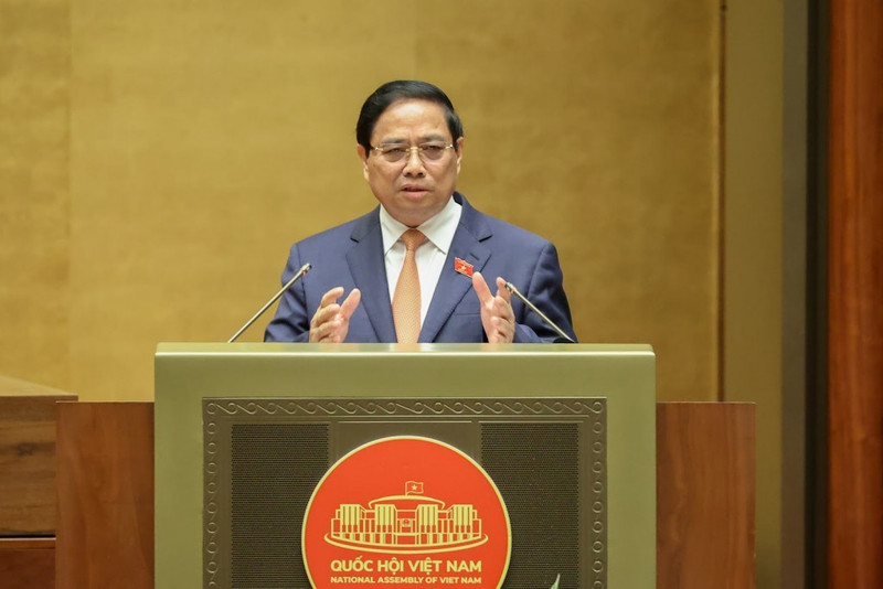 范明正总理在会上发表讲话。